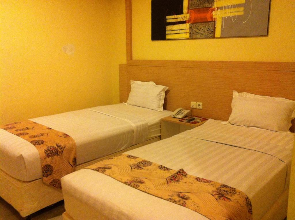 Hotel Paramount Biringkanya Номер фото