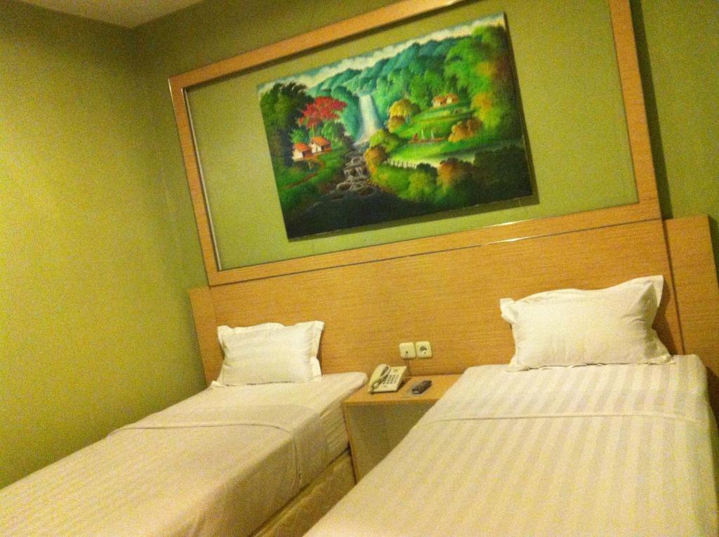 Hotel Paramount Biringkanya Номер фото