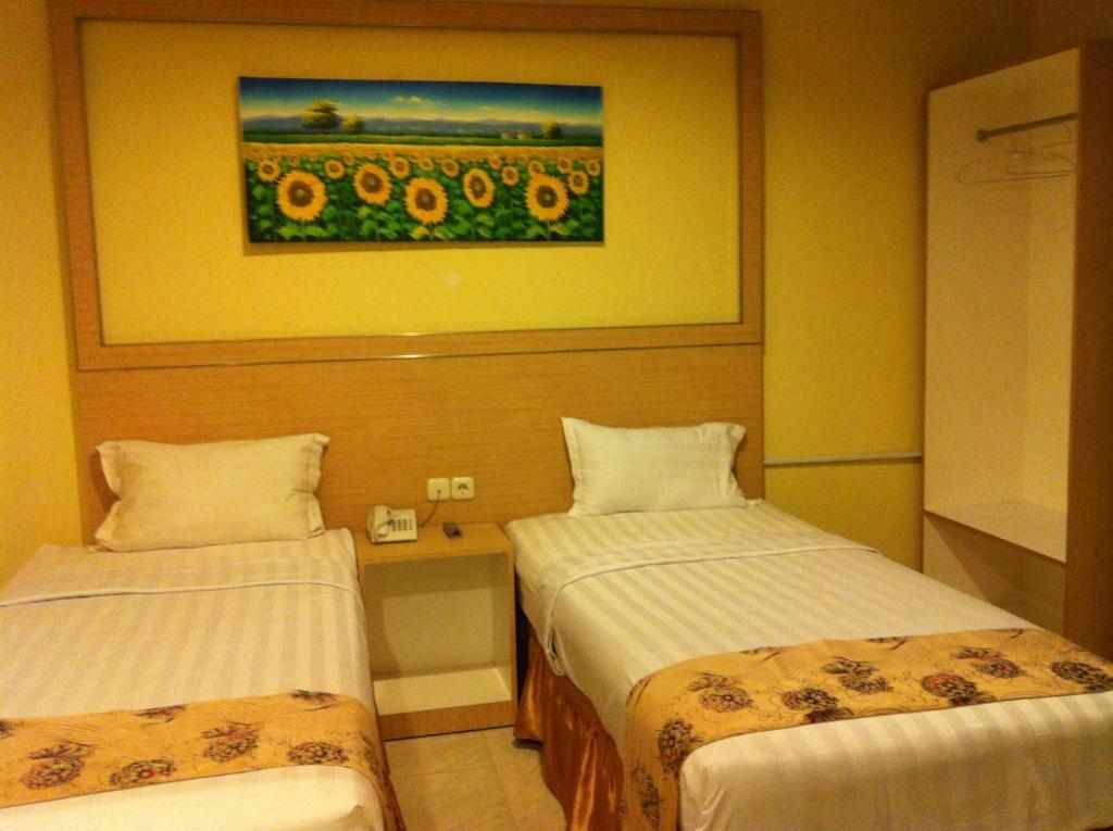 Hotel Paramount Biringkanya Номер фото